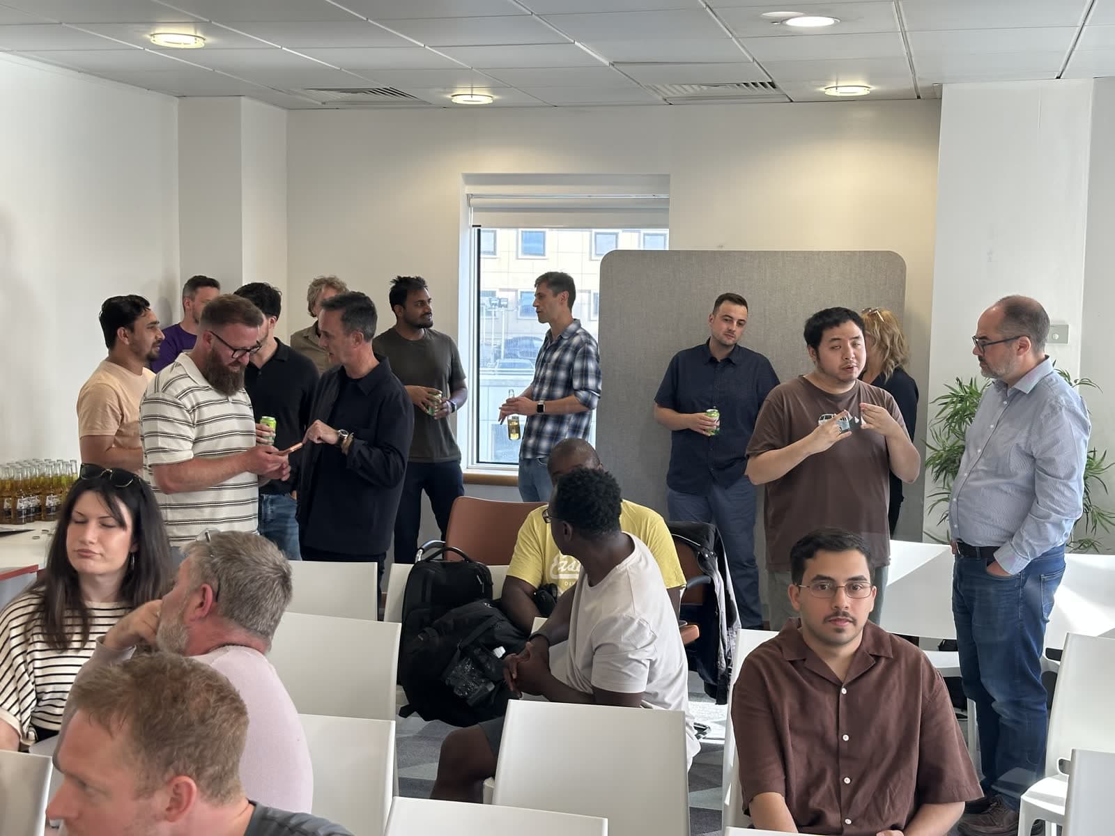 Attendees networking at AI Build: Show and Tell event