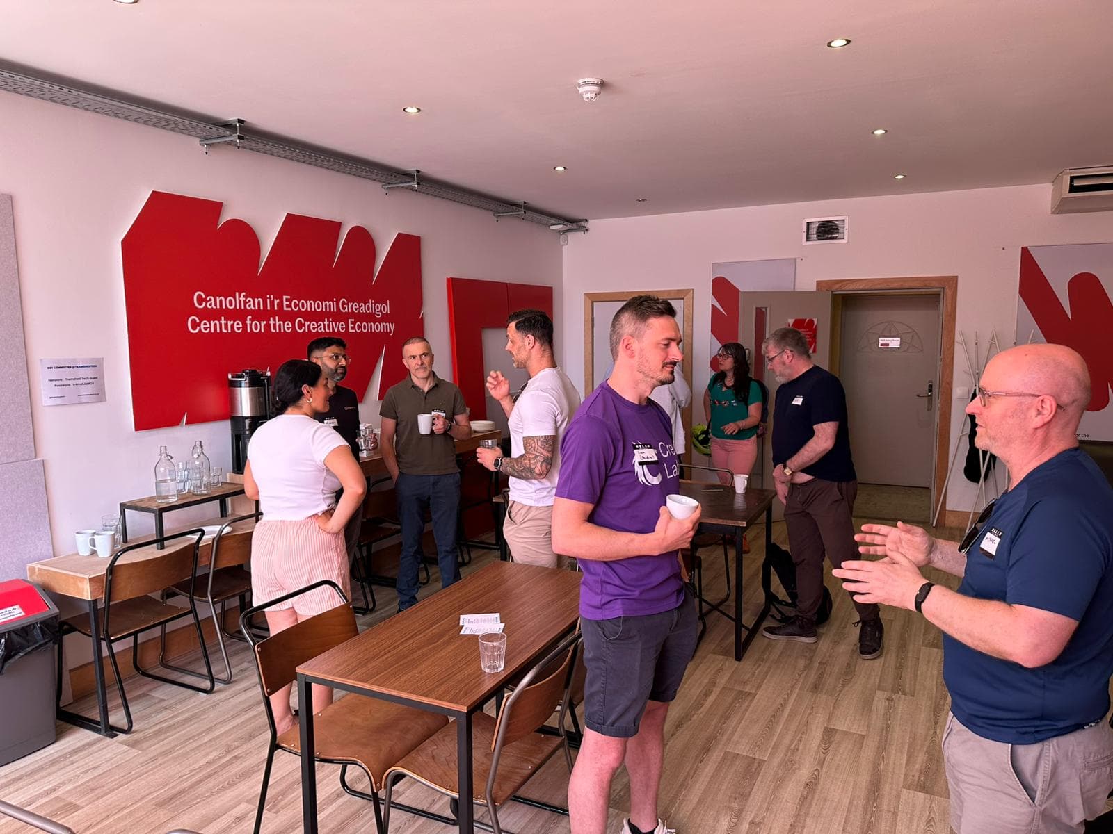 AI Wales community members networking at the Latte Lounge event at Centre for the Creative Economy, Cardiff